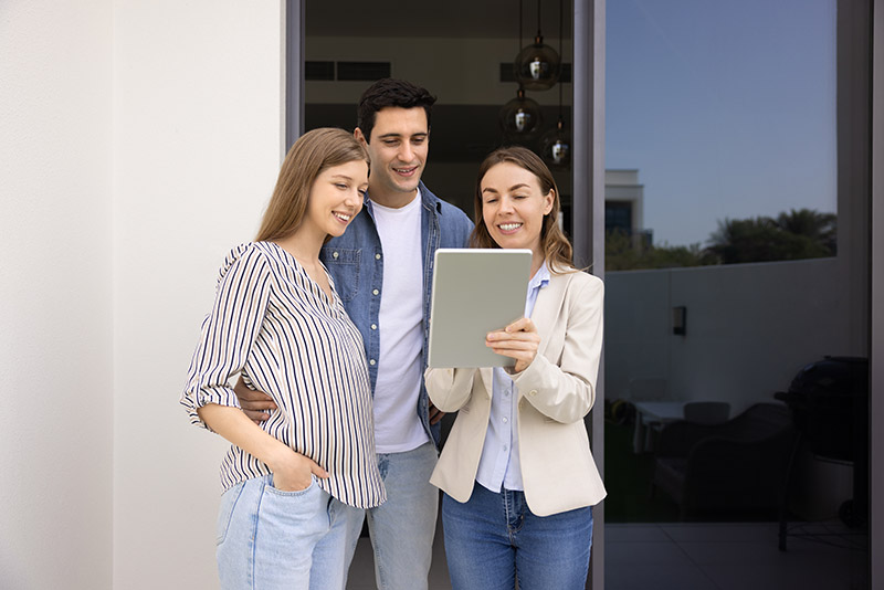 realtor with young couple